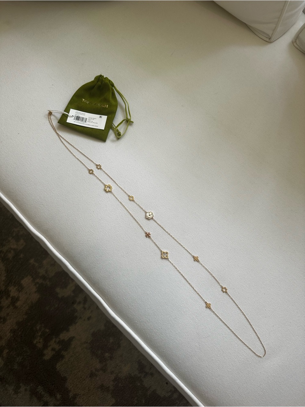 Tory Burch Long Mother of Pearl Necklace with green velvet pouch.